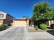 Charming single-story home featuring a front yard with mature shade tree and green shrubs at 7925 S 24Th Way, Phoenix, AZ 85042