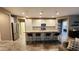 Spacious kitchen with a large island, ample cabinet space, and stainless steel appliances at 7925 S 24Th Way, Phoenix, AZ 85042