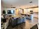 Spacious living room and open kitchen offer a relaxed setting for living and entertaining at 7925 S 24Th Way, Phoenix, AZ 85042