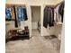 Organized walk-in closet provides ample storage for clothing, shoes, and accessories at 7925 S 24Th Way, Phoenix, AZ 85042