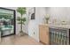 Stylish bar area with wine fridge, modern cabinetry, and views of the pool at 8119 E San Miguel Ave, Scottsdale, AZ 85250