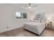 Cozy bedroom with a comfortable bed, soft lighting, and a view from the window at 8119 E San Miguel Ave, Scottsdale, AZ 85250