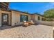 Inviting front patio with comfortable seating, offering a cozy and welcoming entrance to the home at 8119 E San Miguel Ave, Scottsdale, AZ 85250
