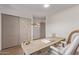 Office with modern desk, chair, and views, featuring light wood laminate flooring at 8119 E San Miguel Ave, Scottsdale, AZ 85250