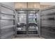 Spacious stainless steel refrigerator with double doors and well-organized interior shelving at 8119 E San Miguel Ave, Scottsdale, AZ 85250