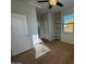 Bedroom featuring carpet floors, natural lighting, and closet at 876 S Colonial Dr, Gilbert, AZ 85296