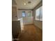 Bonus room with carpet floors, storage cabinets, and window at 876 S Colonial Dr, Gilbert, AZ 85296