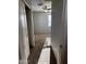 Hallway featuring carpet floors and natural lighting at 876 S Colonial Dr, Gilbert, AZ 85296