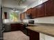 Kitchen with cabinets, countertops, and tiled flooring at 876 S Colonial Dr, Gilbert, AZ 85296