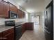 Well-equipped kitchen with appliances and dining area at 876 S Colonial Dr, Gilbert, AZ 85296