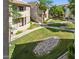 Landscaped apartment complex with lush greenery, walkways, and comfortable living spaces, offering a serene environment at 9450 E Becker Ln # 2067, Scottsdale, AZ 85260