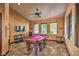 Recreational game room with a pool table, TV, and comfortable seating for entertainment at 9450 E Becker Ln # 2067, Scottsdale, AZ 85260