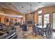 Comfortable lounge area featuring leather sofas, stone fireplace, and dining table with seating at 9450 E Becker Ln # 2067, Scottsdale, AZ 85260