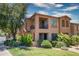 Two story townhouse with private balcony, covered entry, desert landscaping and stucco finish at 10655 N 9Th St # 112, Phoenix, AZ 85020