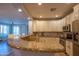 Beautiful kitchen with granite countertops, stainless steel appliances, and white shaker cabinets at 10655 N 9Th St # 112, Phoenix, AZ 85020