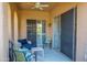 A private patio with seating and a ceiling fan at 10655 N 9Th St # 112, Phoenix, AZ 85020
