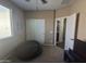 Spacious bedroom with closet and plenty of room for relaxing or gaming at 10773 W Prickly Pear Trl, Peoria, AZ 85383