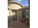 Inviting entrance with a cozy courtyard seating area, creating a welcoming ambiance at 10773 W Prickly Pear Trl, Peoria, AZ 85383