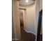 Hallway with hardwood floors and beautiful arches that let in natural light at 10773 W Prickly Pear Trl, Peoria, AZ 85383
