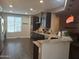 Spacious kitchen with granite counters, pendant lights, and ample cabinet space at 10773 W Prickly Pear Trl, Peoria, AZ 85383