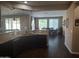 Open kitchen flows into dining area with view to additional living space at 10773 W Prickly Pear Trl, Peoria, AZ 85383