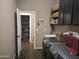 Laundry room complete with washer, dryer, utility sink, and walk-in pantry at 10773 W Prickly Pear Trl, Peoria, AZ 85383