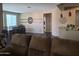 Spacious living room flows into dining area, offering plenty of living space at 10773 W Prickly Pear Trl, Peoria, AZ 85383