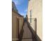 Side yard with a secure gate access at 10773 W Prickly Pear Trl, Peoria, AZ 85383