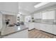 Kitchen with marble countertops, and stainless steel appliances at 10873 W Clair Dr, Sun City, AZ 85351