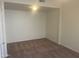 Bedroom with carpet flooring and a light at 11109 W Amelia Ave, Avondale, AZ 85392