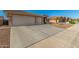 Spacious garage and driveway of a well-maintained house in a quiet neighborhood at 11312 E Newcastle Ave, Mesa, AZ 85209
