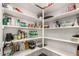 Pantry featuring multiple shelves providing lots of storage space at 11312 E Newcastle Ave, Mesa, AZ 85209