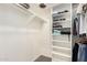 Spacious walk-in closet with built in shelving for optimal storage and organization at 11312 E Newcastle Ave, Mesa, AZ 85209
