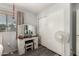 This is a bedroom with a vanity, closet, and a light gray floor at 1232 S 120Th Ln, Avondale, AZ 85323