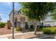 Two-story home featuring manicured landscaping and inviting curb appeal, creating a welcoming atmosphere at 1232 S 120Th Ln, Avondale, AZ 85323