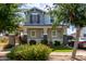 Charming two-story home featuring a covered porch, well-maintained landscaping, and a welcoming facade at 1232 S 120Th Ln, Avondale, AZ 85323