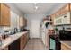 Functional kitchen with ample counter space and cabinets for storage plus essential appliances at 1232 S 120Th Ln, Avondale, AZ 85323