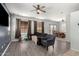 Spacious living area with vinyl floors seamlessly connecting to the dining area, ideal for entertaining guests at 1232 S 120Th Ln, Avondale, AZ 85323