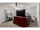 Main bedroom features a large dresser and comfortable sleeping arrangements, with carpet floors at 1232 S 120Th Ln, Avondale, AZ 85323