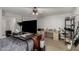 Main bedroom features a comfortable bed, dresser, and workspace, plus carpet floors at 1232 S 120Th Ln, Avondale, AZ 85323