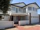 Charming two-story home with brick accents, balcony, and attached two-car garage at 13438 N 18Th Ln, Phoenix, AZ 85029