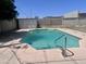 A sparkling in-ground pool surrounded by ample space for outdoor living and entertaining at 13438 N 18Th Ln, Phoenix, AZ 85029