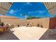 Private courtyard with tables and chairs providing an outdoor living area at 13644 W Aleppo Dr, Sun City West, AZ 85375