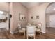Cozy dining area featuring a round glass table and seating for four at 13644 W Aleppo Dr, Sun City West, AZ 85375
