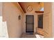 Single-story home showcasing the front door with desert landscaping and a concrete walkway at 13644 W Aleppo Dr, Sun City West, AZ 85375