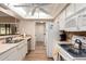 Practical kitchen with ample counter space and essential appliances for efficient cooking at 13644 W Aleppo Dr, Sun City West, AZ 85375