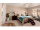 Comfortable main bedroom featuring a ceiling fan, neutral walls, and ample natural light at 13644 W Aleppo Dr, Sun City West, AZ 85375