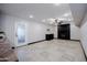 Finished basement with recessed lighting, tile flooring, and a fireplace, perfect for entertaining at 1551 E Glencove St, Mesa, AZ 85203