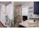 This bathroom features a walk-in shower with decorative tile and vanity with granite counter at 1551 E Glencove St, Mesa, AZ 85203