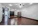 The bedroom features a closet with a large mirror and wood-look tile floors at 1551 E Glencove St, Mesa, AZ 85203